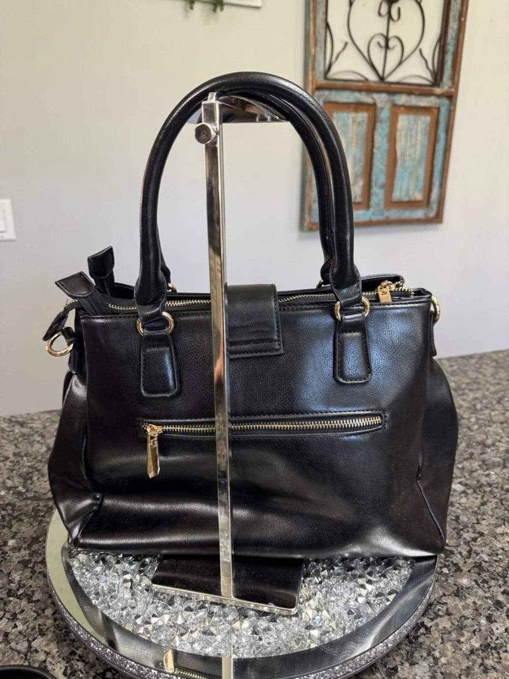 Women's Black Leather Satchel with Gold-Tone Lock and crossbody strap EUC